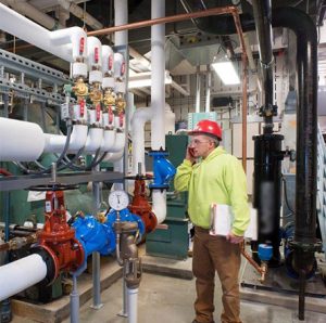 Craft & Sons Project Foreman Gerry Brown Inspects EVAPCO Tower Pumps