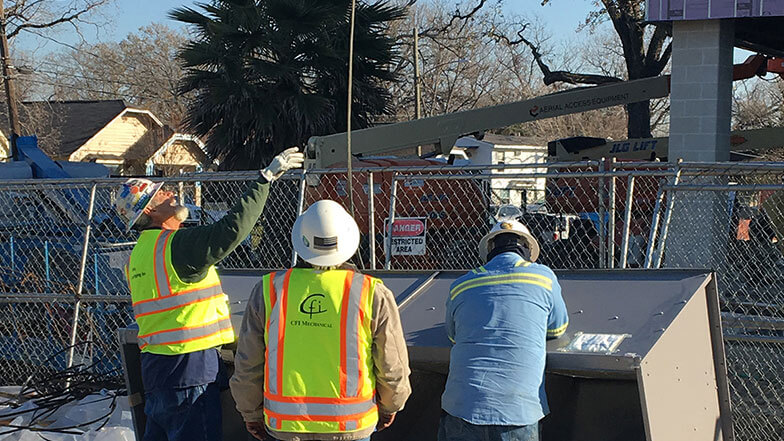CFI Workers Install Carrier Equipment